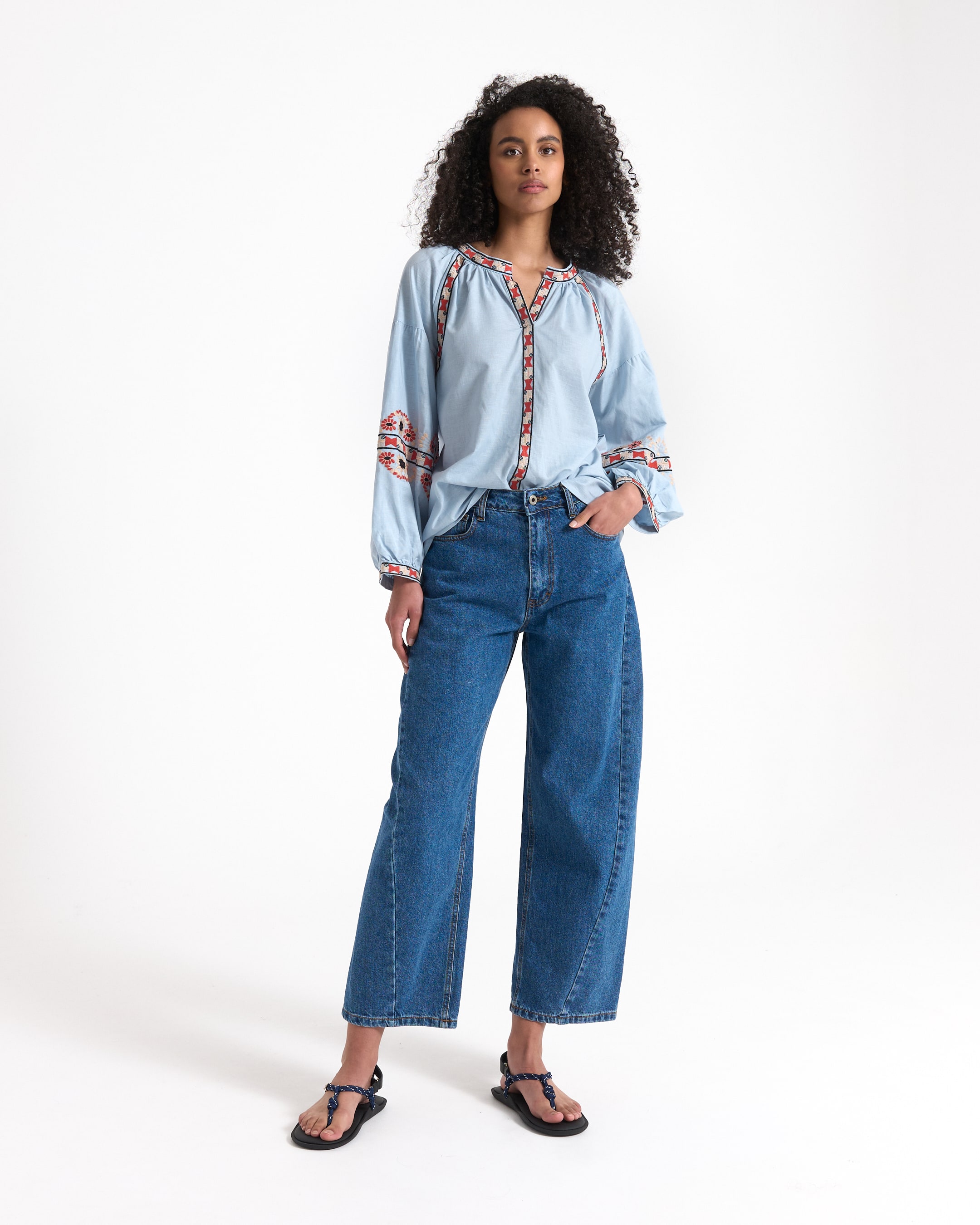 denim jeans, wide leg, blue top, embroidered details, sandals