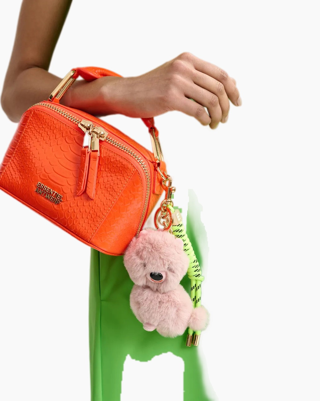 orange bag, crossbody bag, textured leather, gold hardware, keychain charm