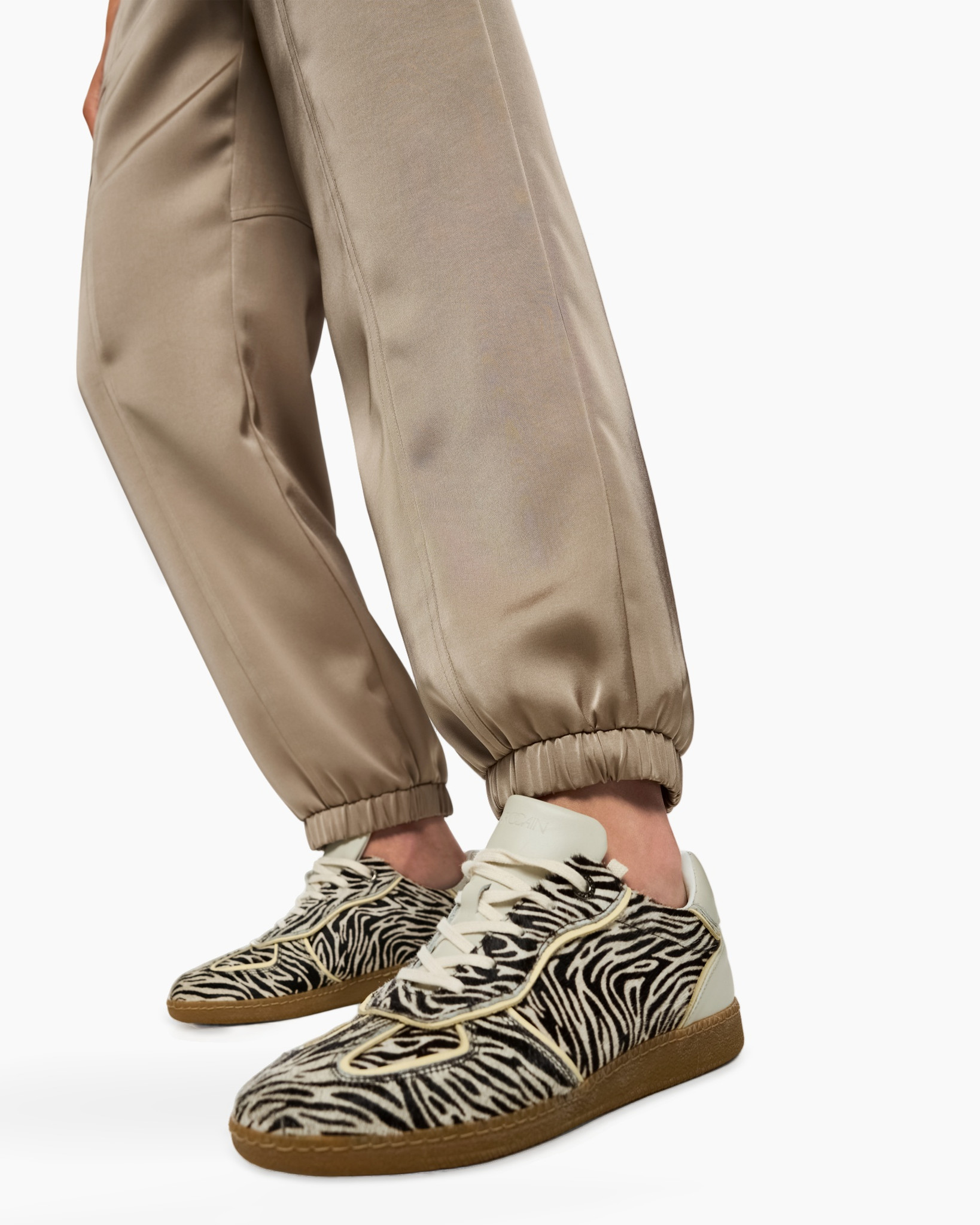 pants, tapered, beige, elastic-cuff, sneakers, zebra-pattern