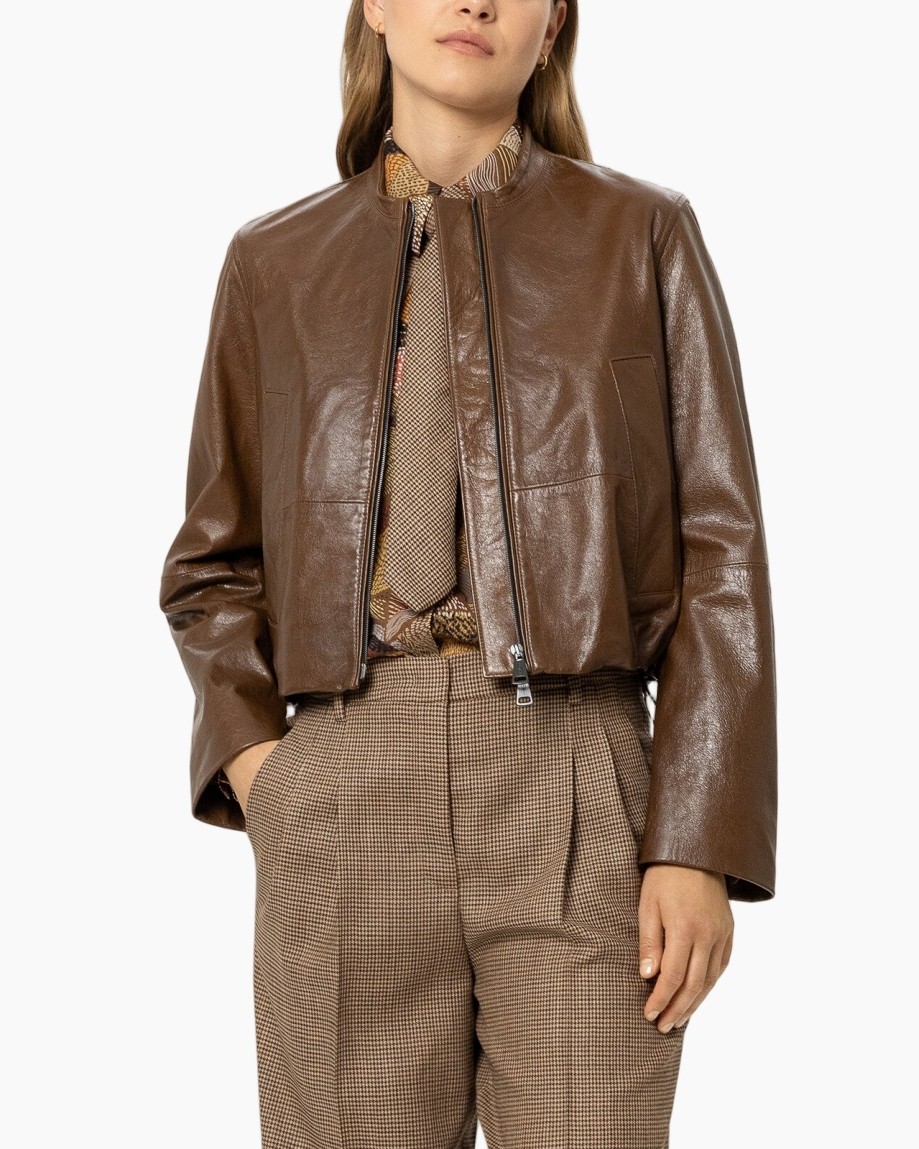 brown leather jacket, bomber jacket, brown pants, plaid trousers, collared shirt