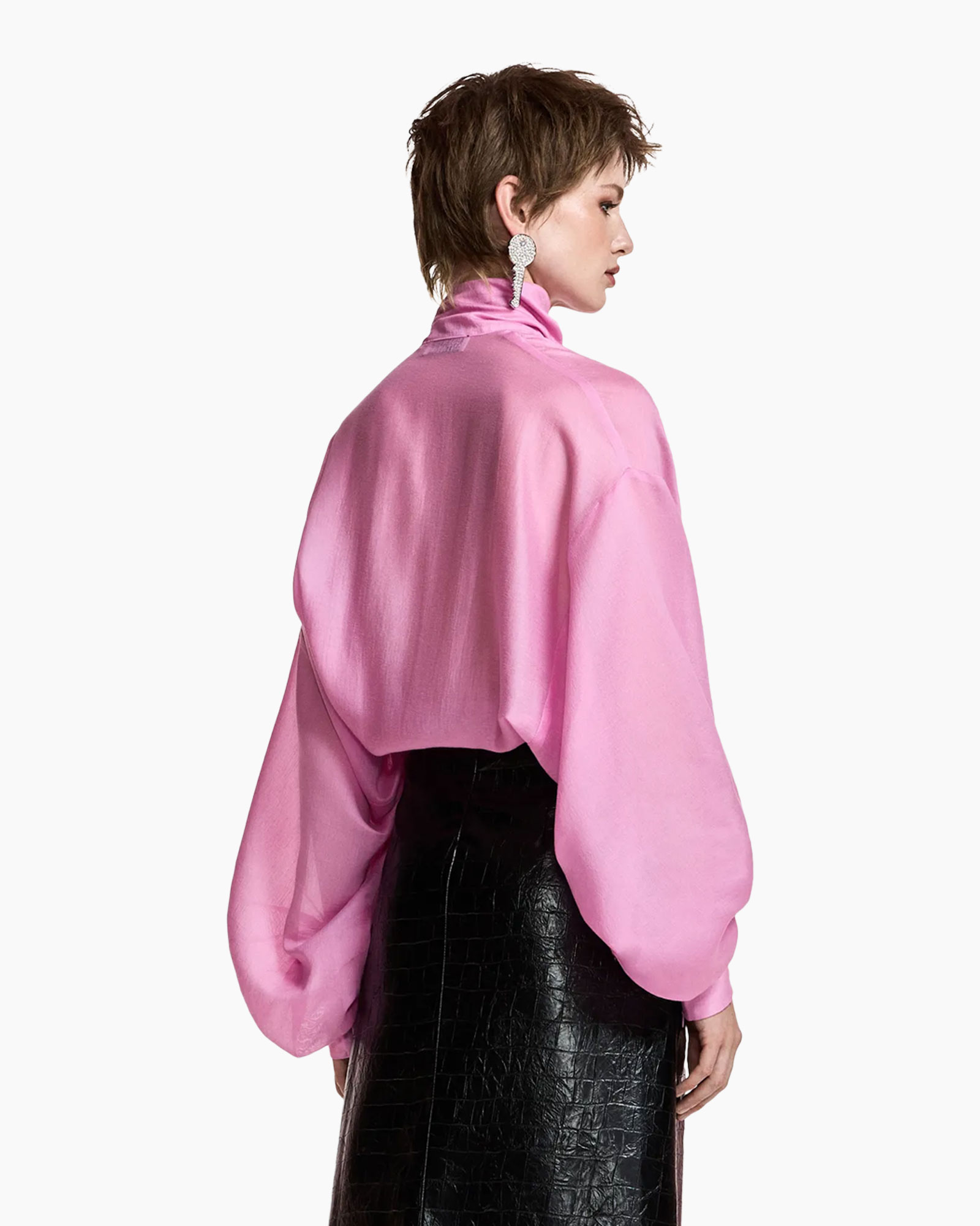 pink blouse, satiny, puff sleeves, turtleneck, earring