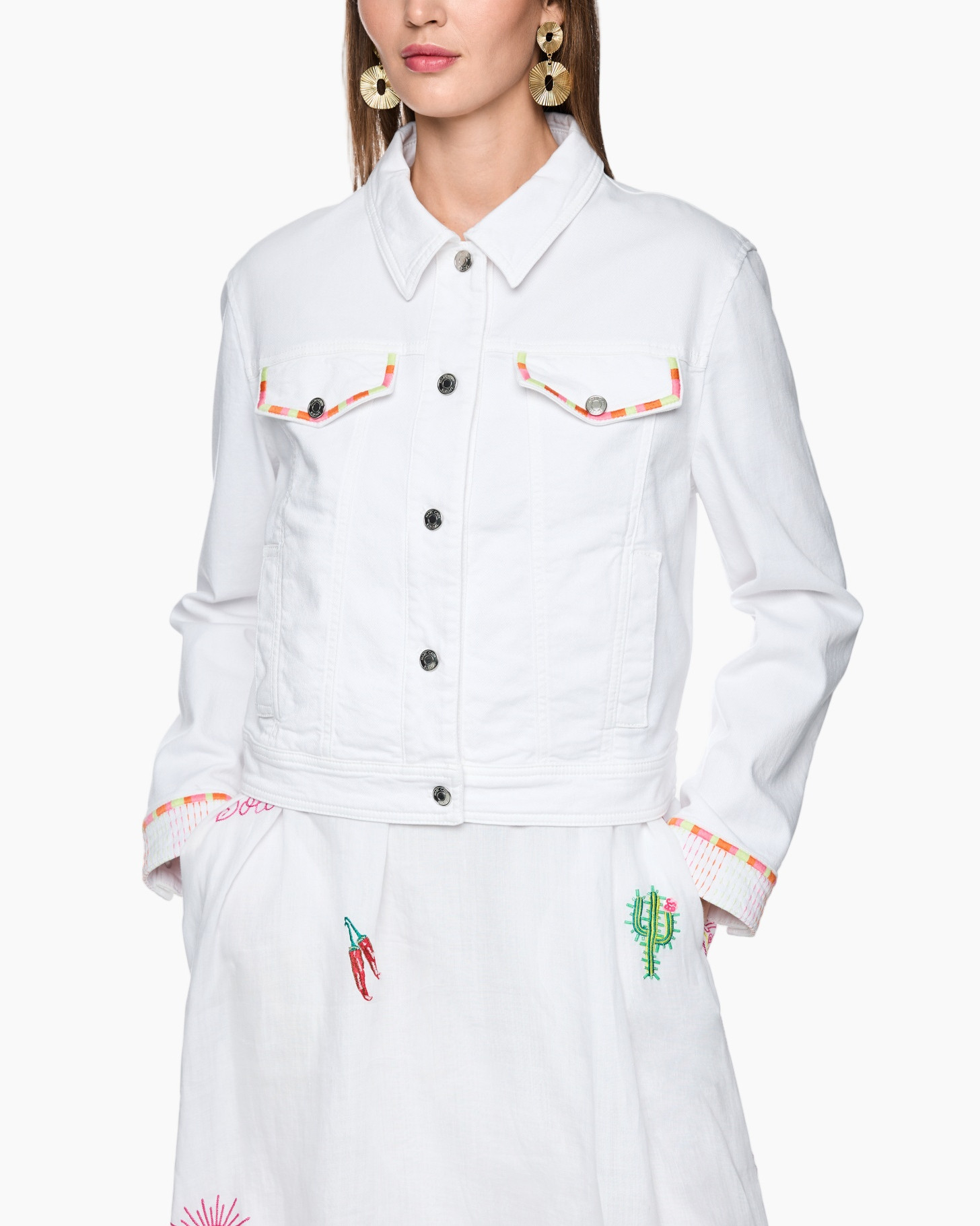 white denim jacket, button front, pocket flaps, embellished trim, white skirt with embroidery