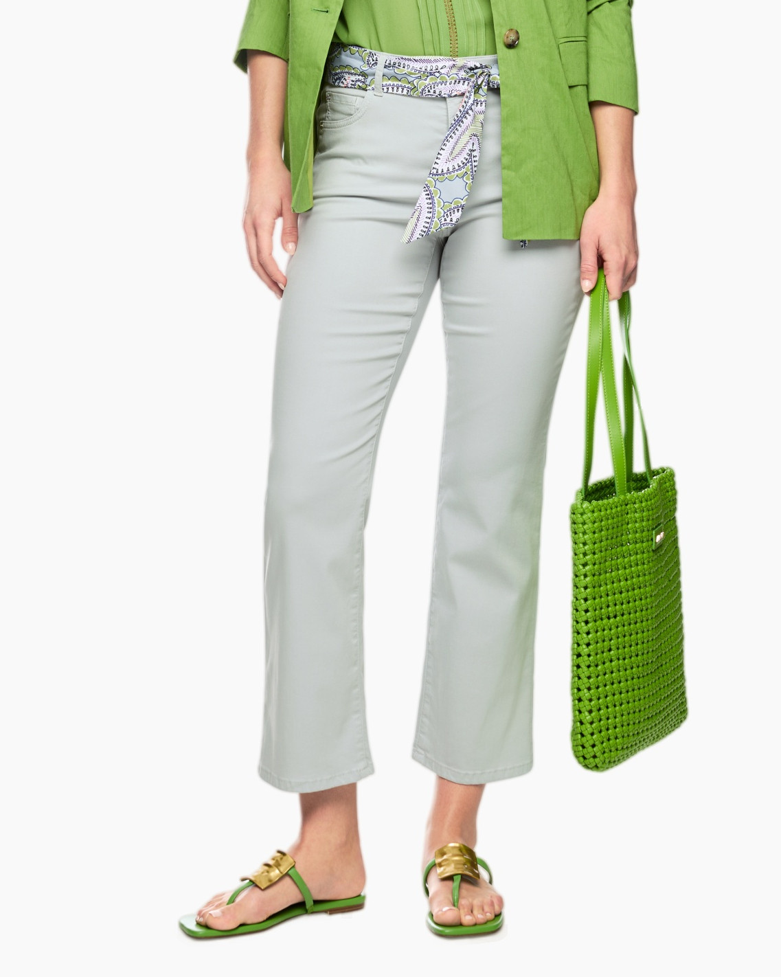 pants, light gray, cropped length, green accessories, sandals