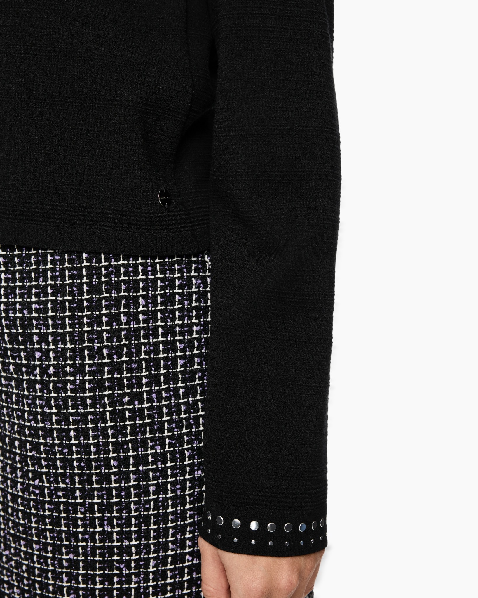 black-sleeve, ribbed-knit, studded-cuff, tweed-skirt, black-top