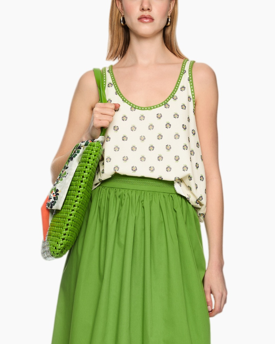 tank top, floral pattern, green skirt, green trim, woven bag