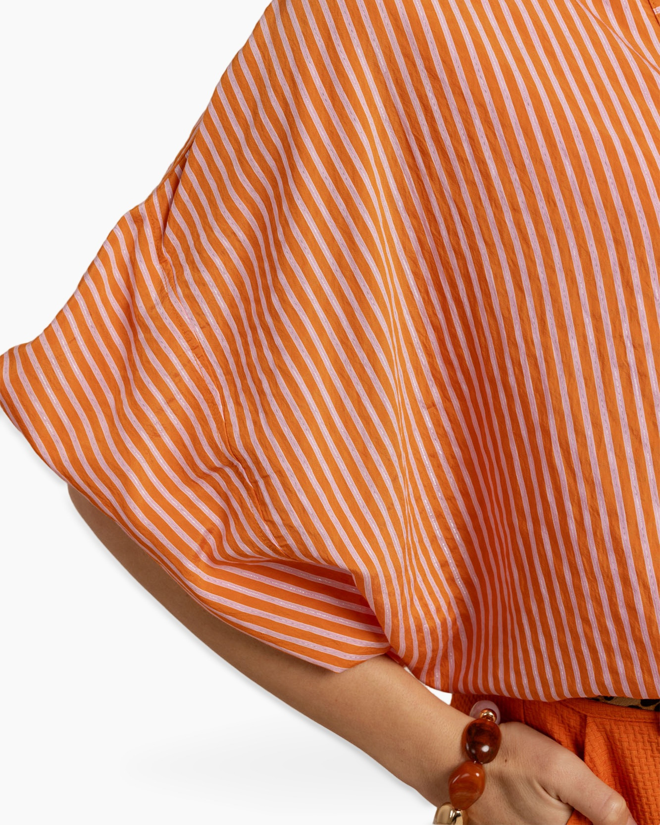 striped shirt, orange stripe, linen top, short sleeve, accessory bracelet