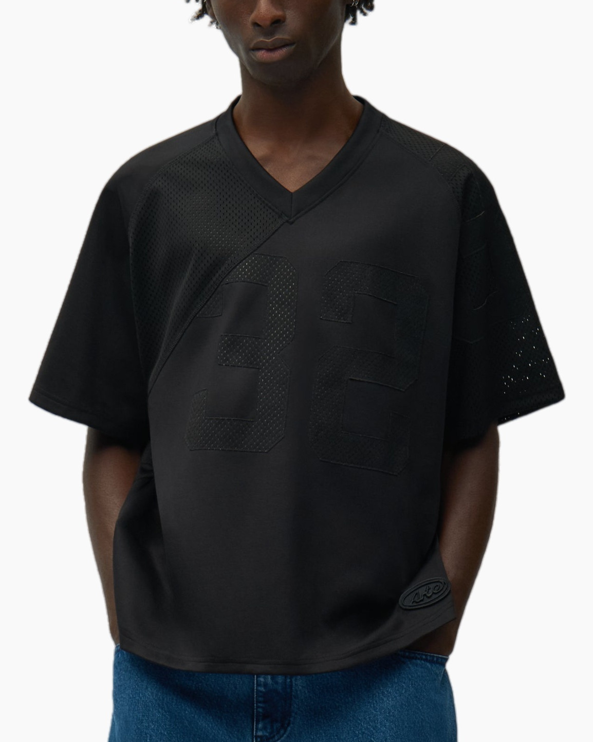 black jersey,  oversized tee,  mesh panels,  V-neck,  large number 23