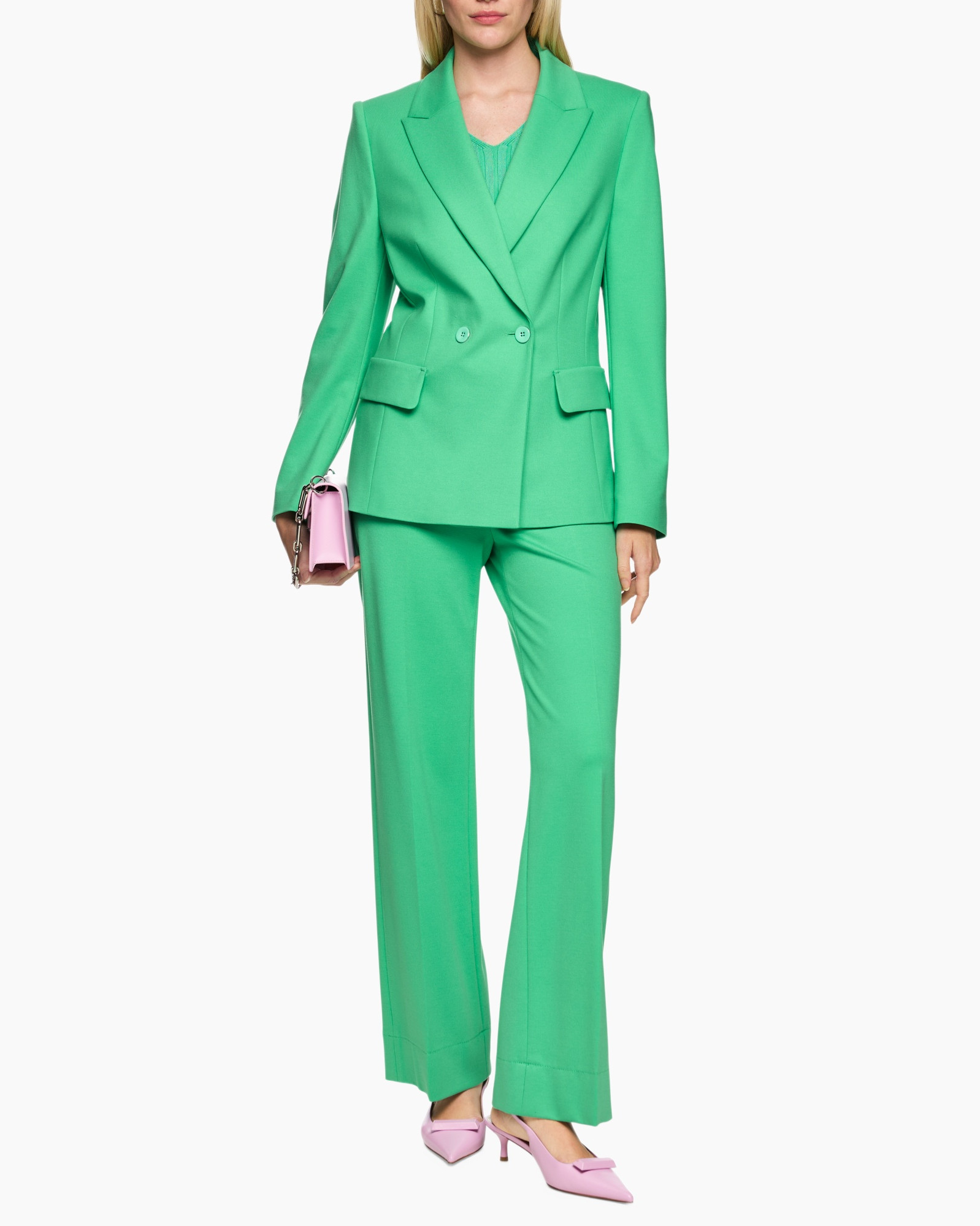 green suit, double-breasted, blazer, wide-leg pants, pink accessories