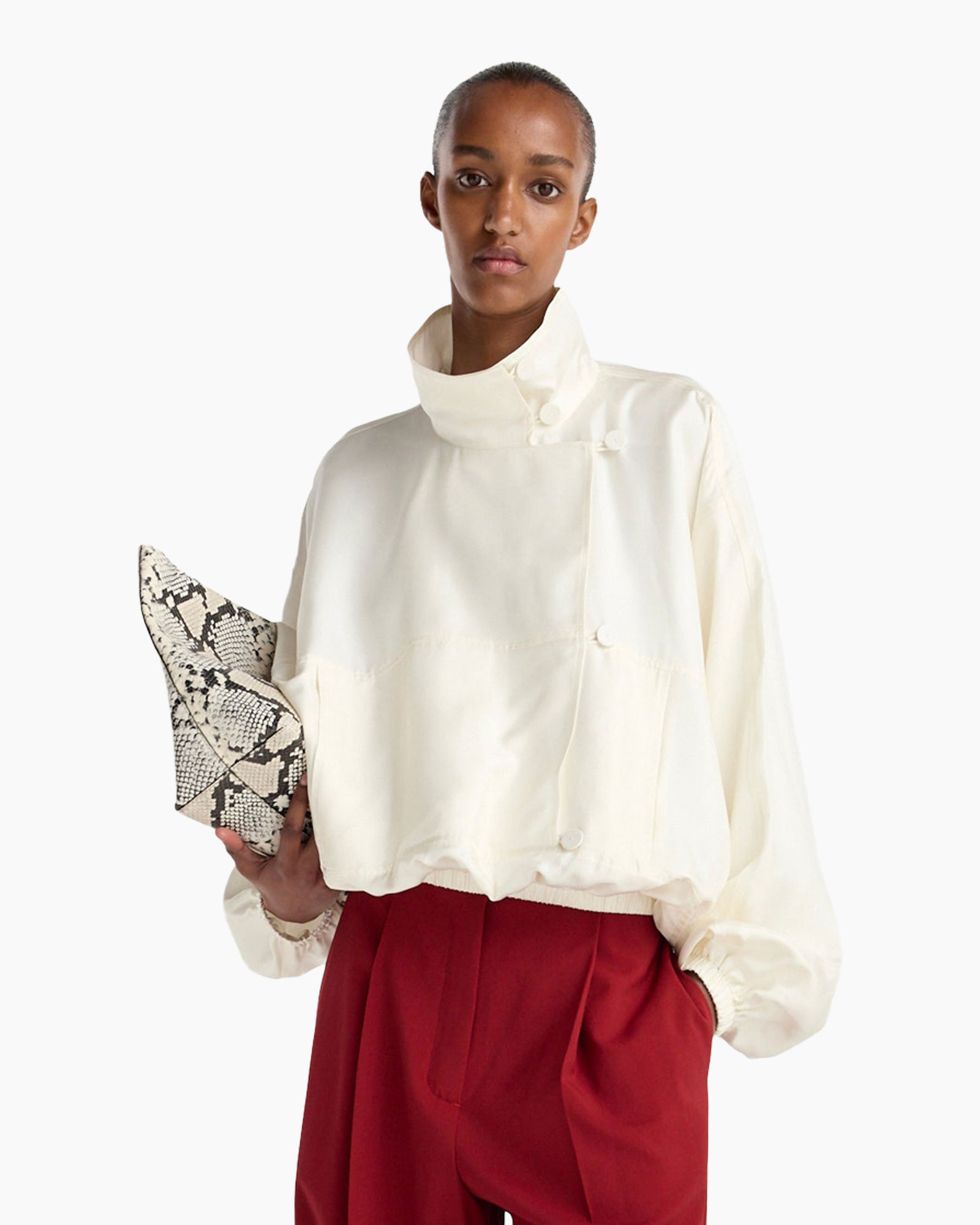 white jacket, high collar, button closure, pocketed, red pants