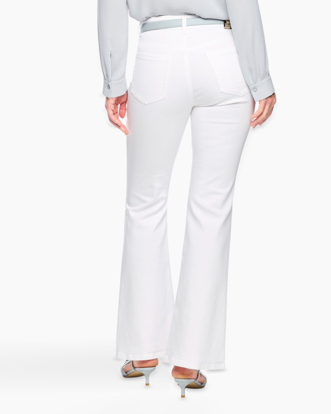 white pants, flared jeans, belted, light blue shoes, high heels