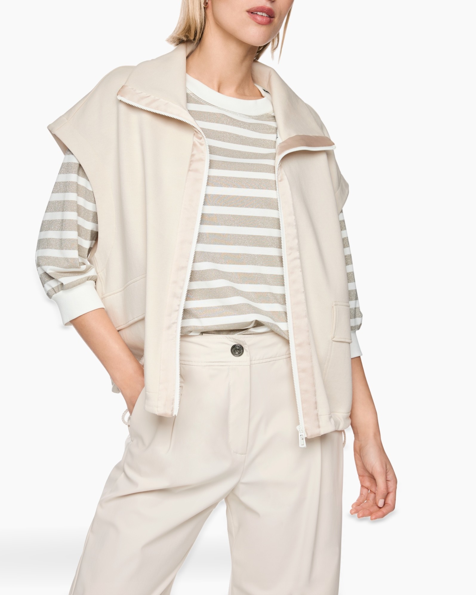 beige vest, zip front,  striped top, long sleeve, pockets