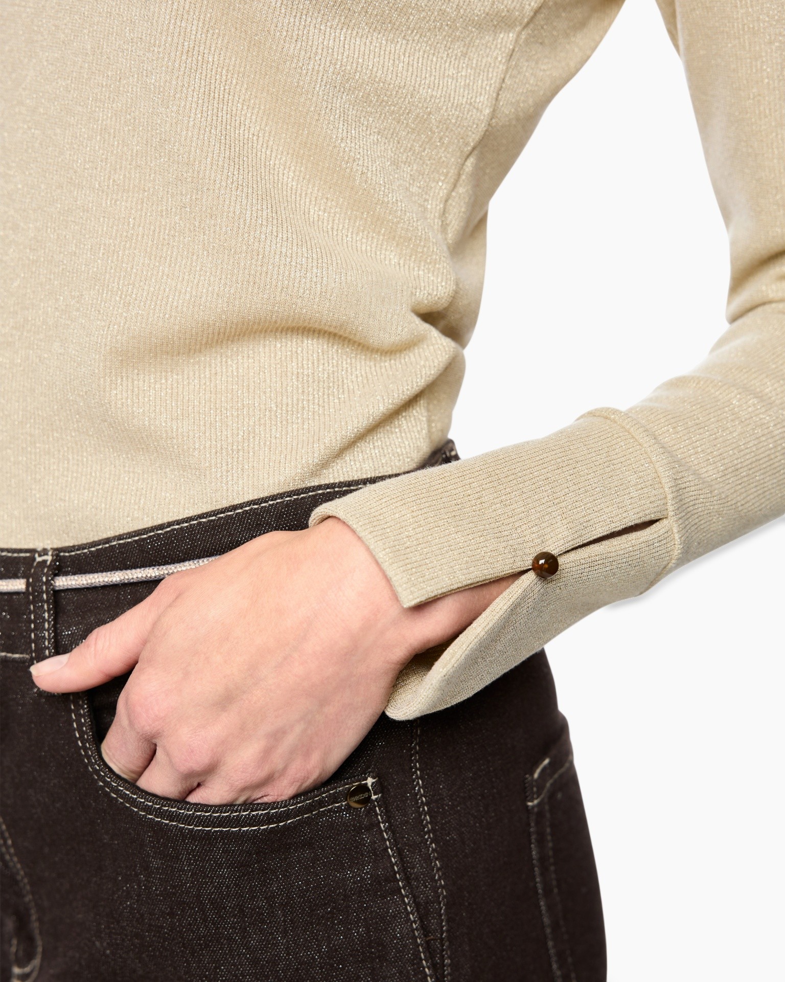 beige knit, longsleeve, turtleneck?, sleeve cuff, denim jeans, pocket, brown button, hand in pocket, soft fabric, stitching
