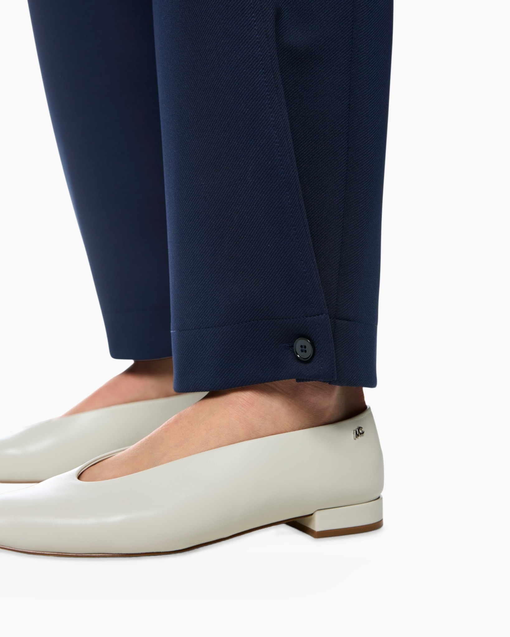 navy trousers, pants hem, buttoned cuff, slim fit, dress shoe