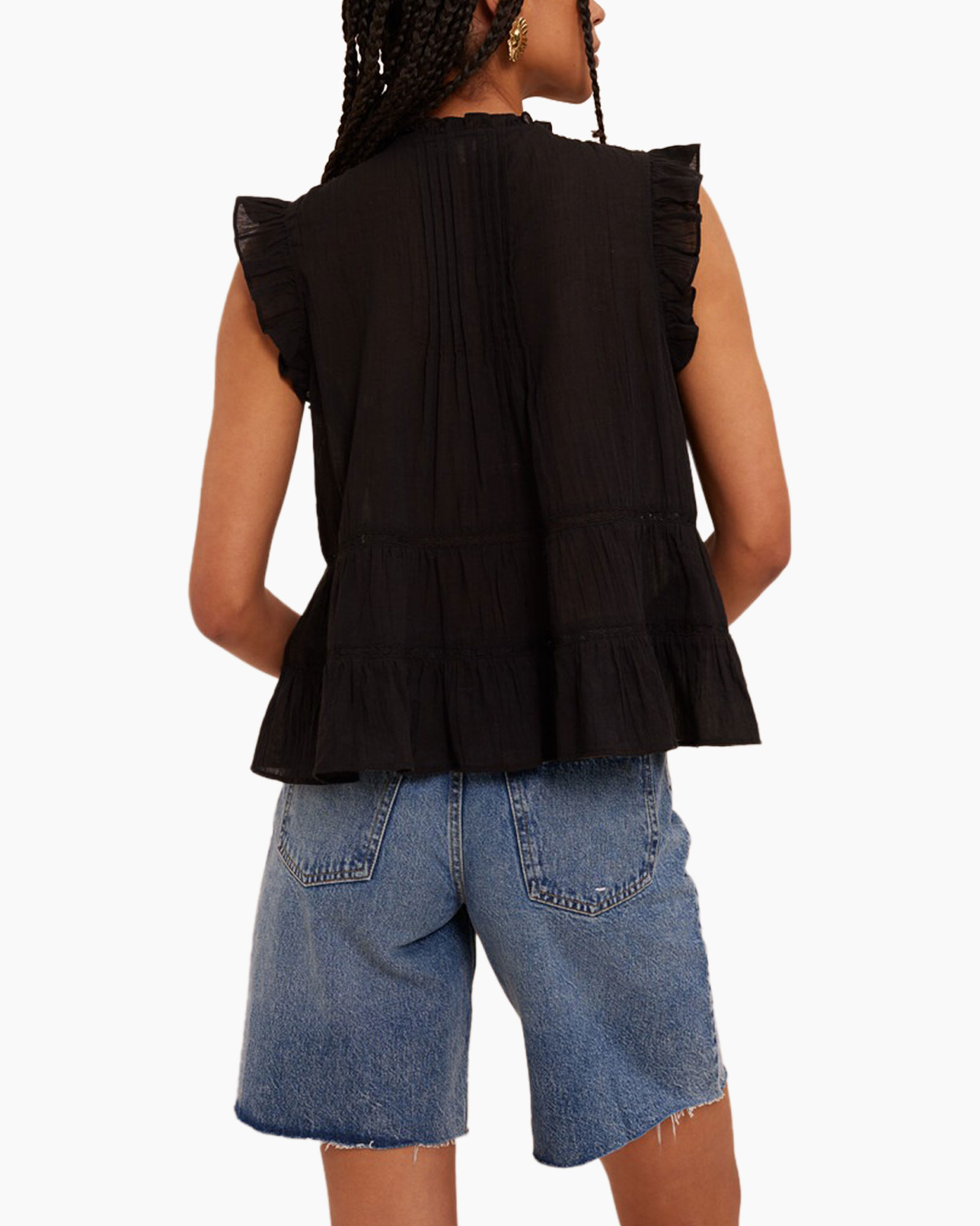black sleeveless top, tiered ruffle top, pleated back, peplum hem, denim shorts