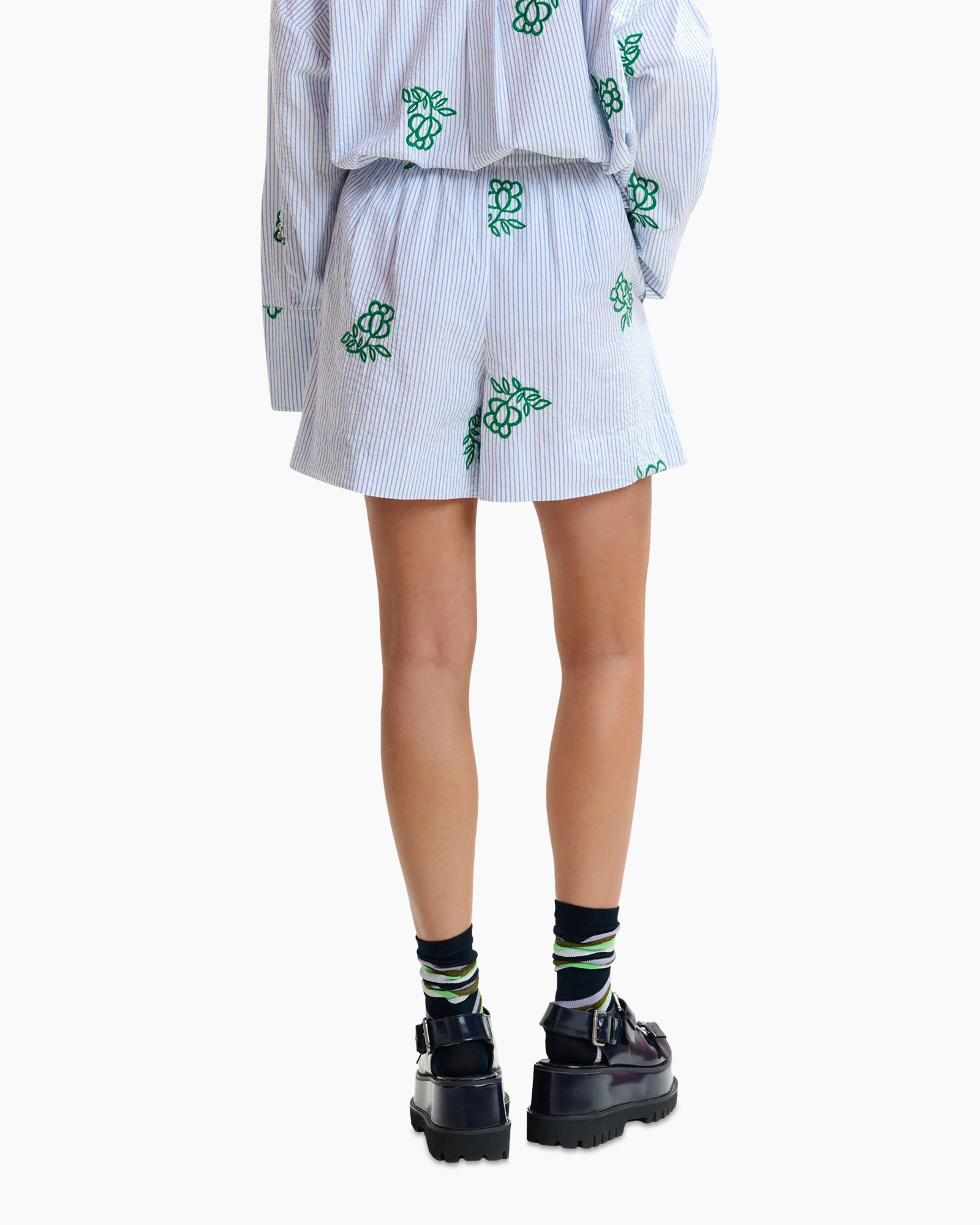 Coat, Shorts, Shoe, Person, Skirt