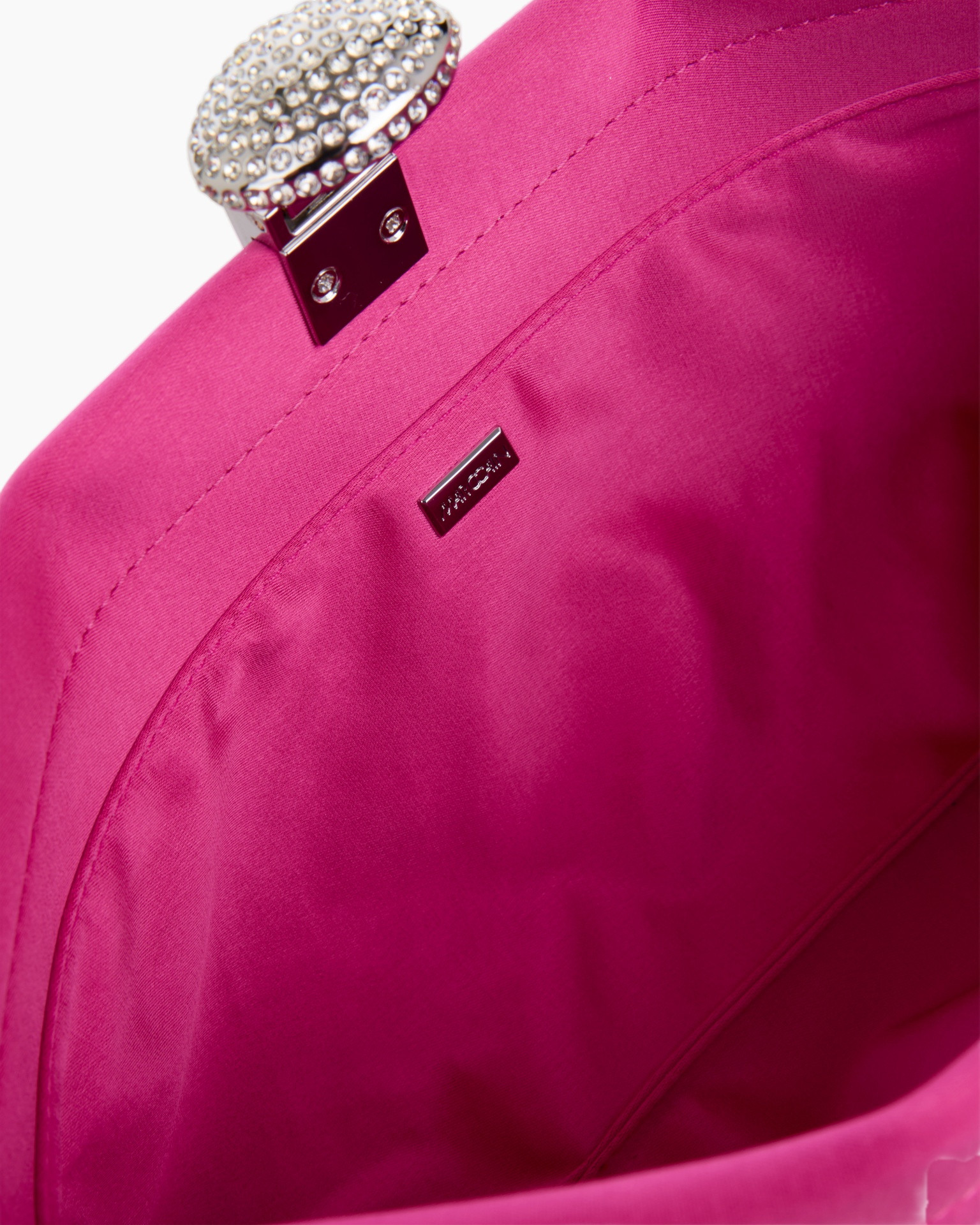 pink handbag, sparkly clasp, metal hardware, lining, small tag