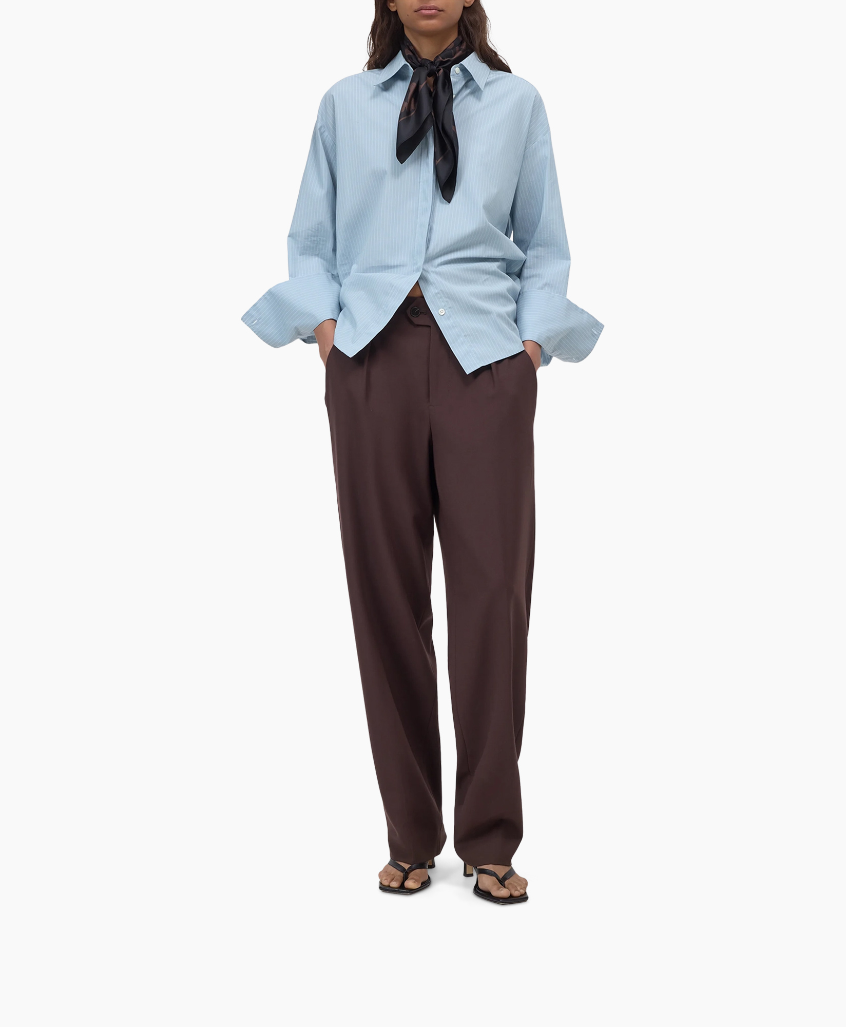 button-down, blue shirt, scarf, brown pants, sandals