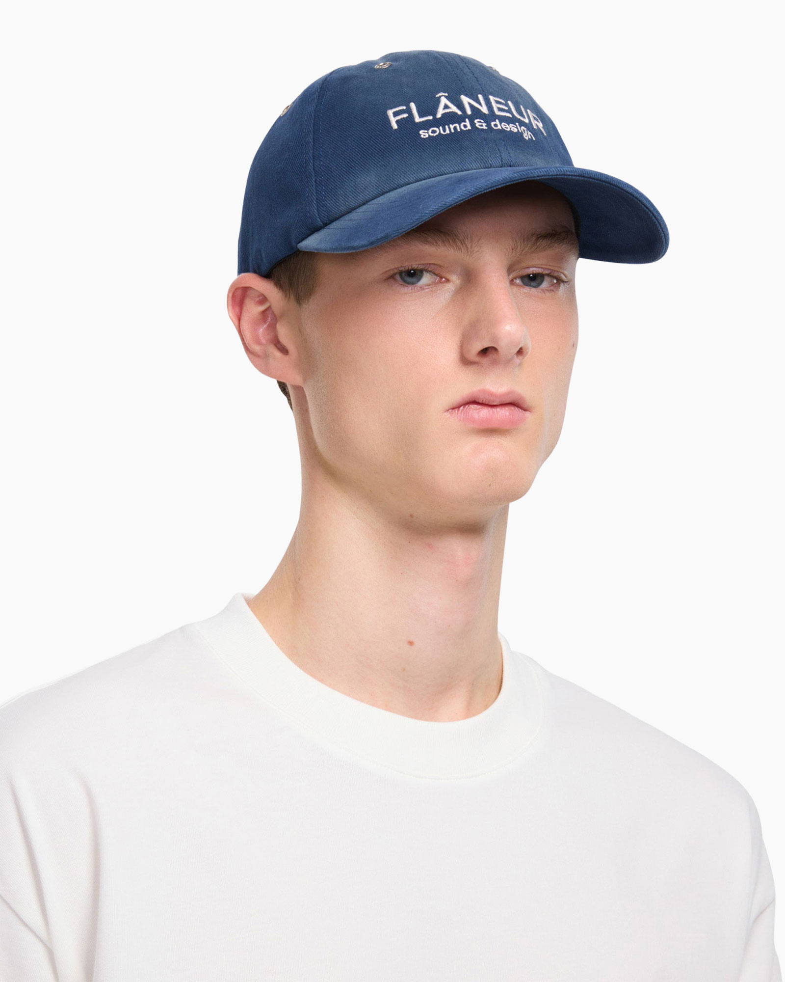 baseball cap, navy cap, logo text, adjustable strap, casual hat, baseball cap, blue cap, logo text, adjustable, casual hat
