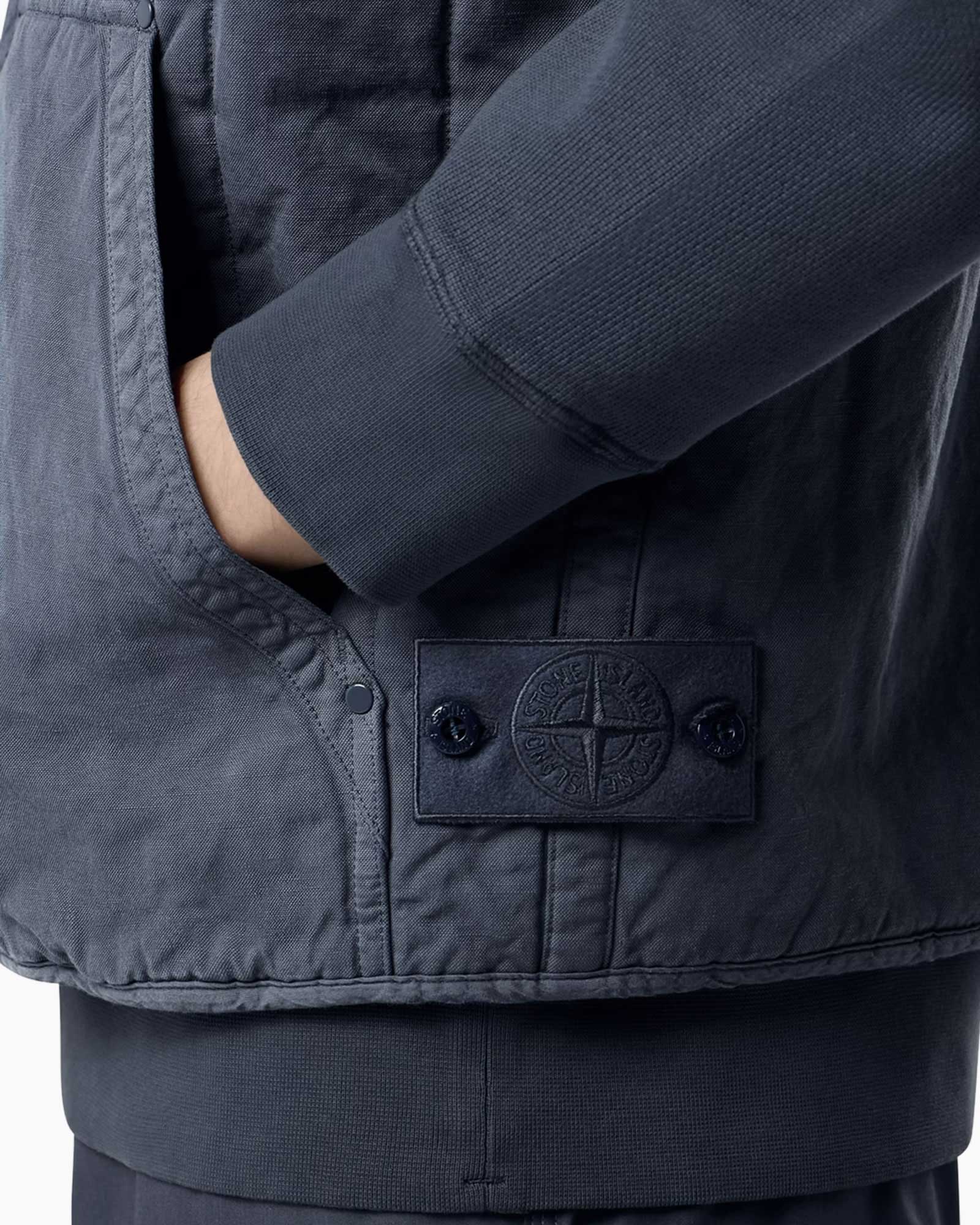 navy jacket, padded vest, pocket, logo patch, ribbed hem