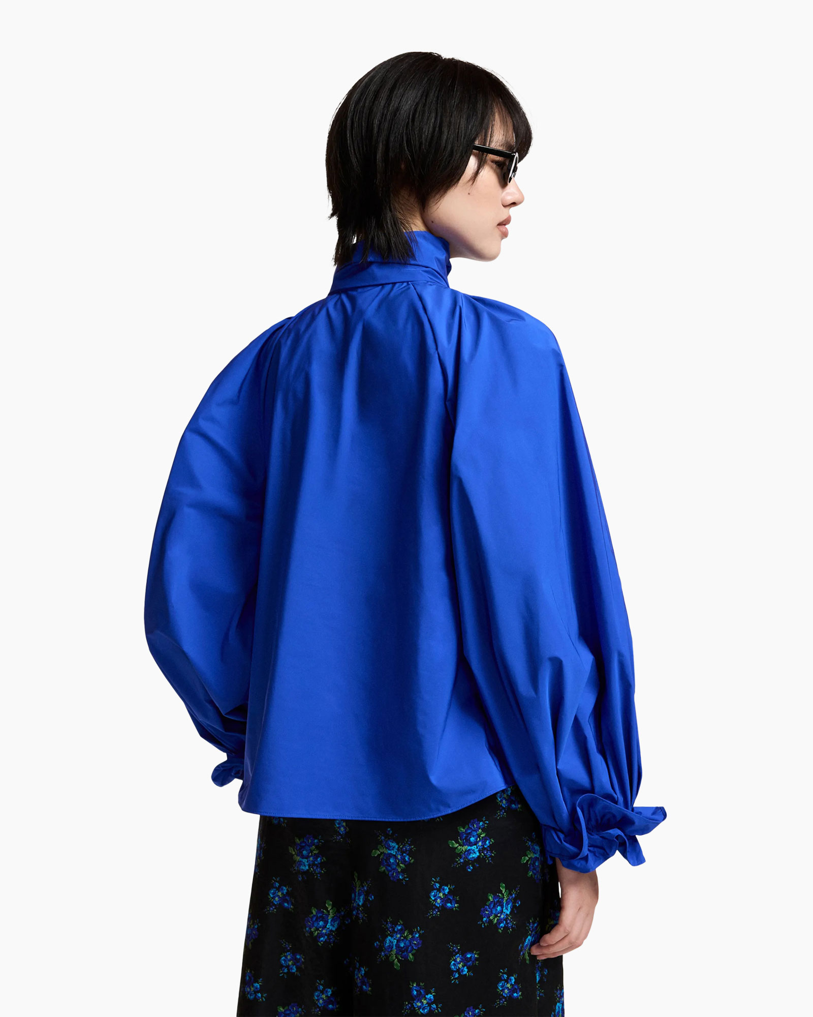 blue blouse, puff sleeve, jackard? no