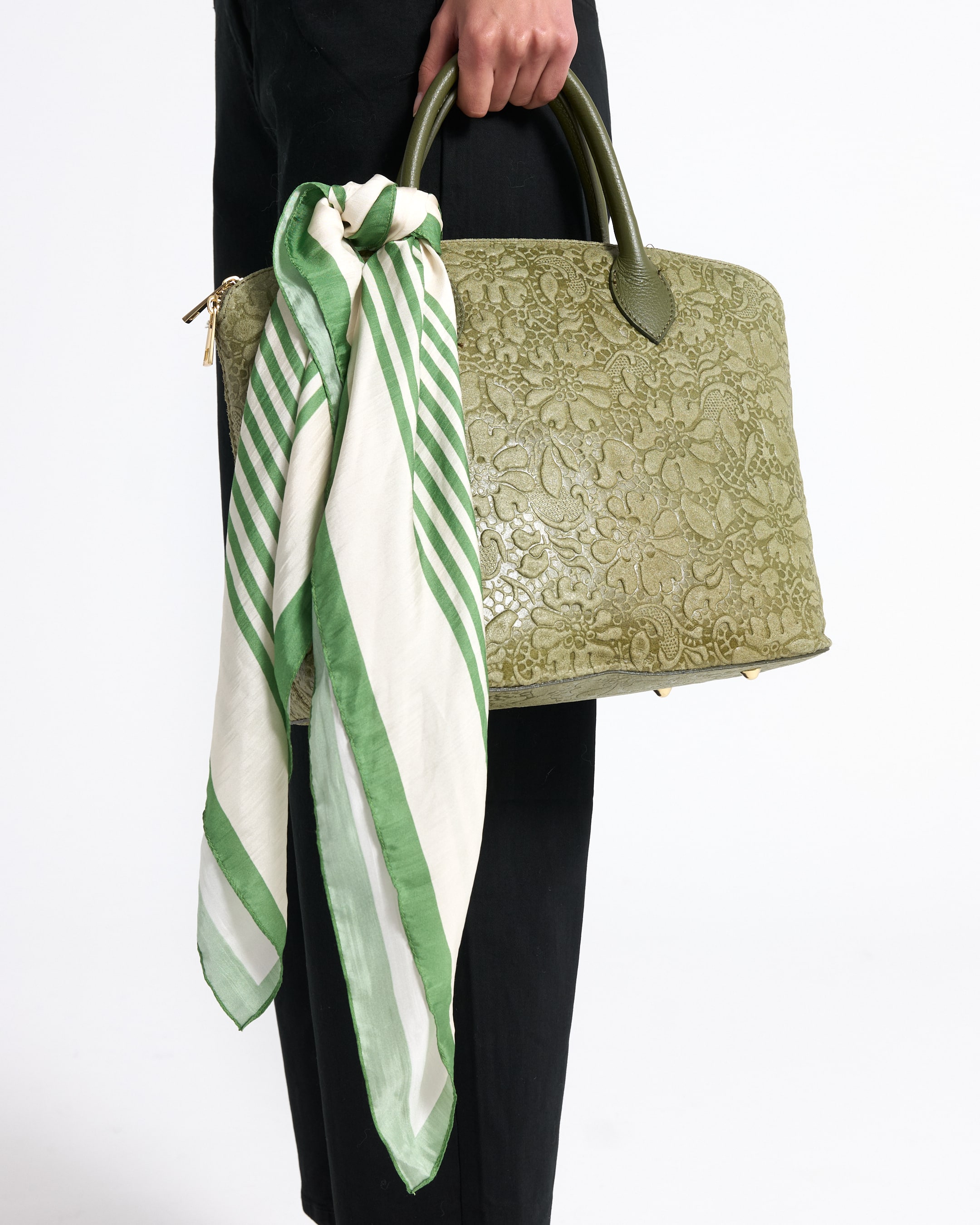 green handbag, embossed floral, lattice pattern, two-tone scarf, knitted handle?