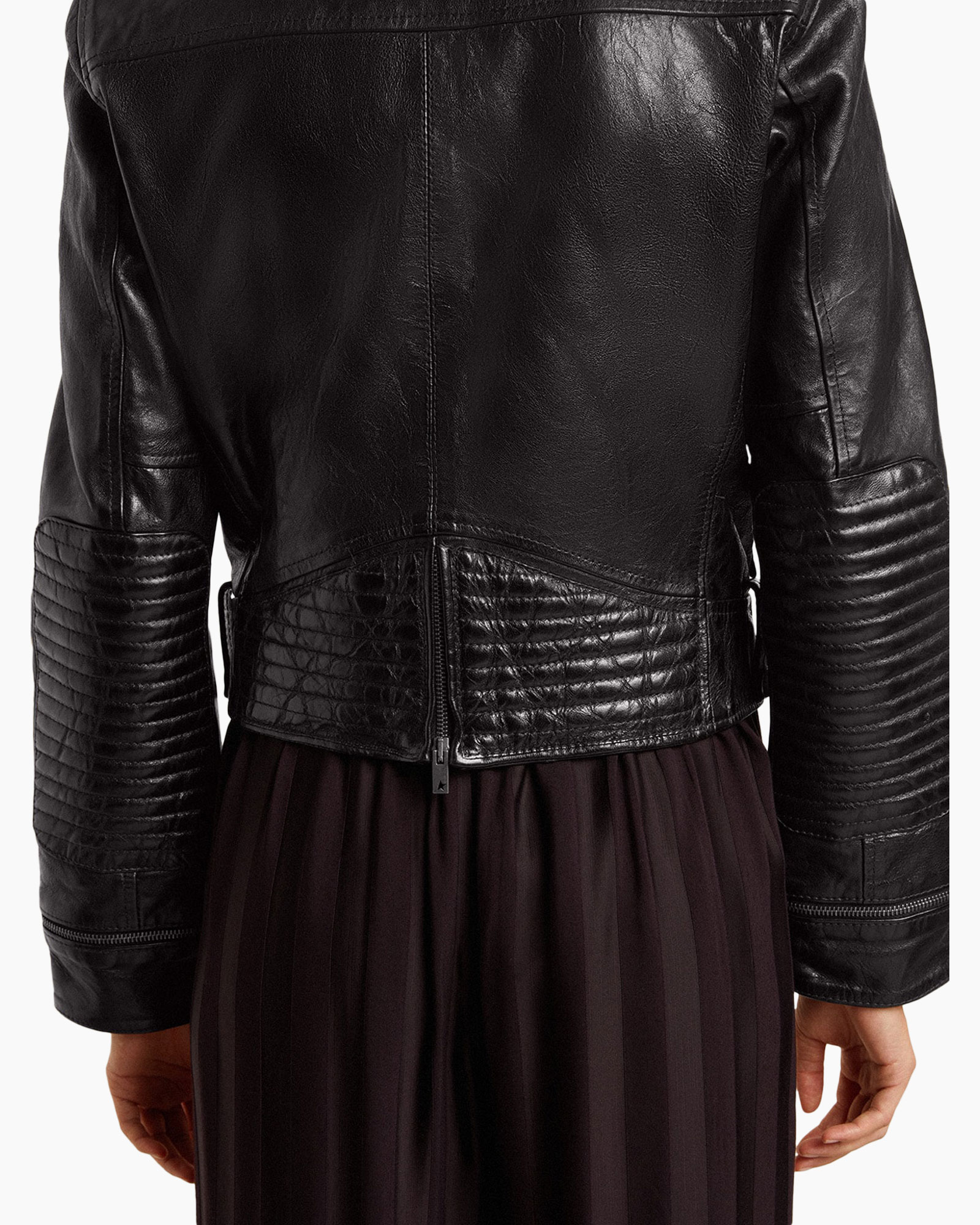 leather jacket, biker jacket, zippers, pelts, dark brown skirt?