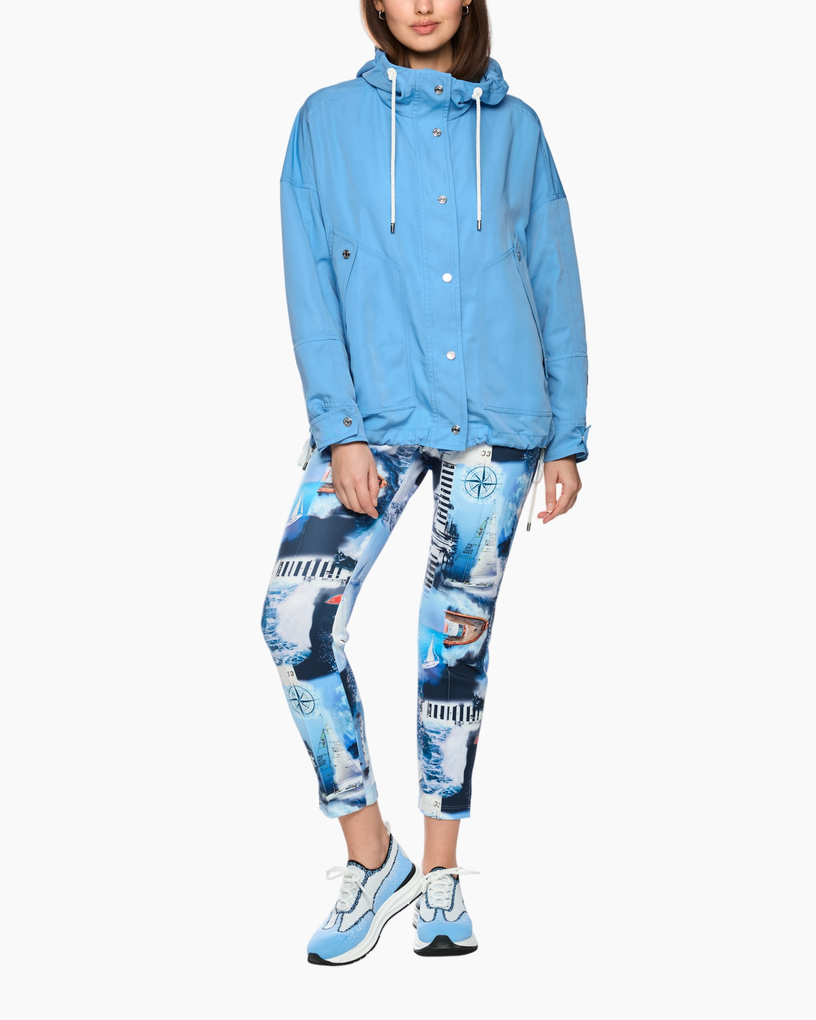 light blue jacket, hooded windbreaker, drawstring hood, snap button front, printed leggings