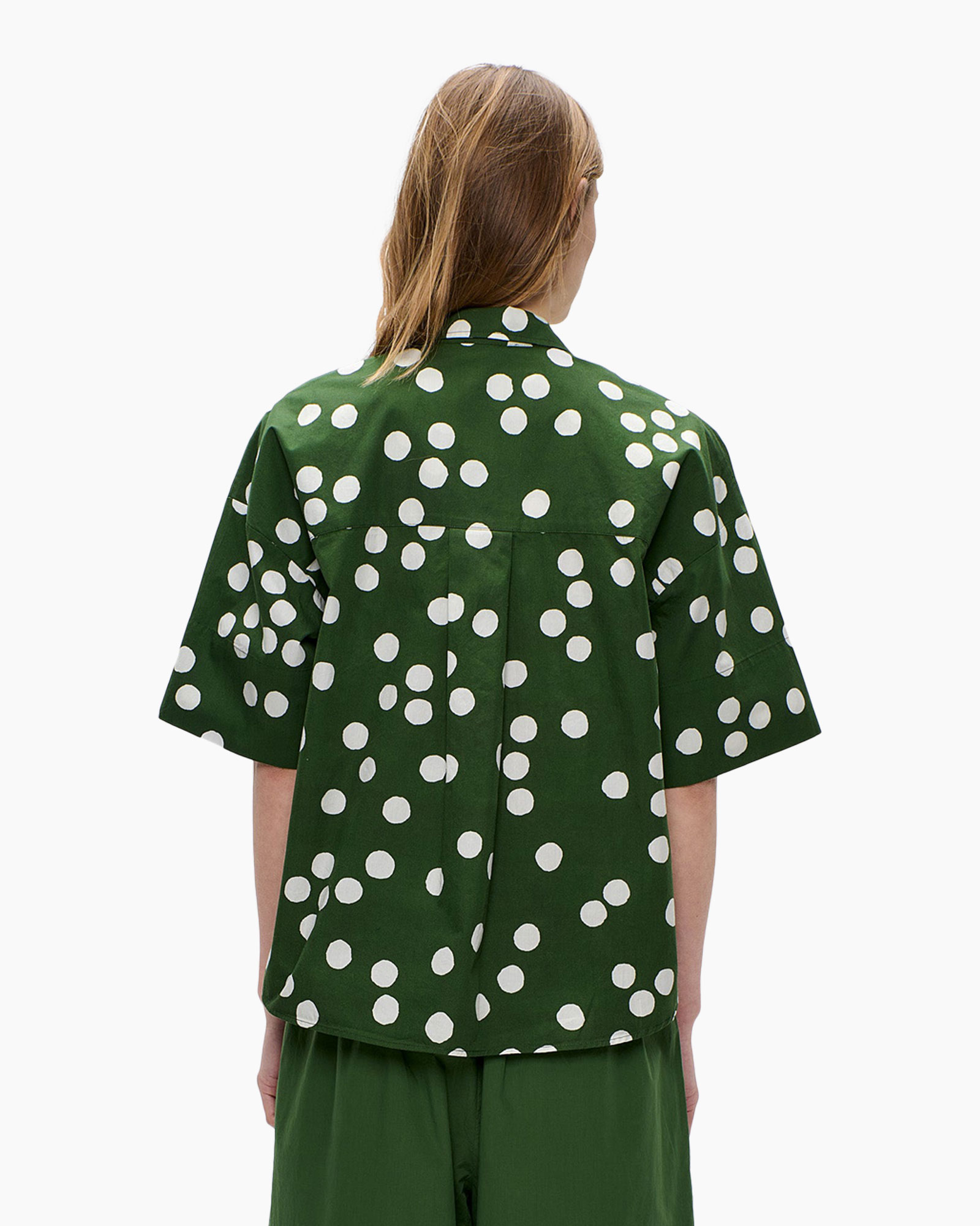 green shirt, polka dot, short sleeve, collared, button-down