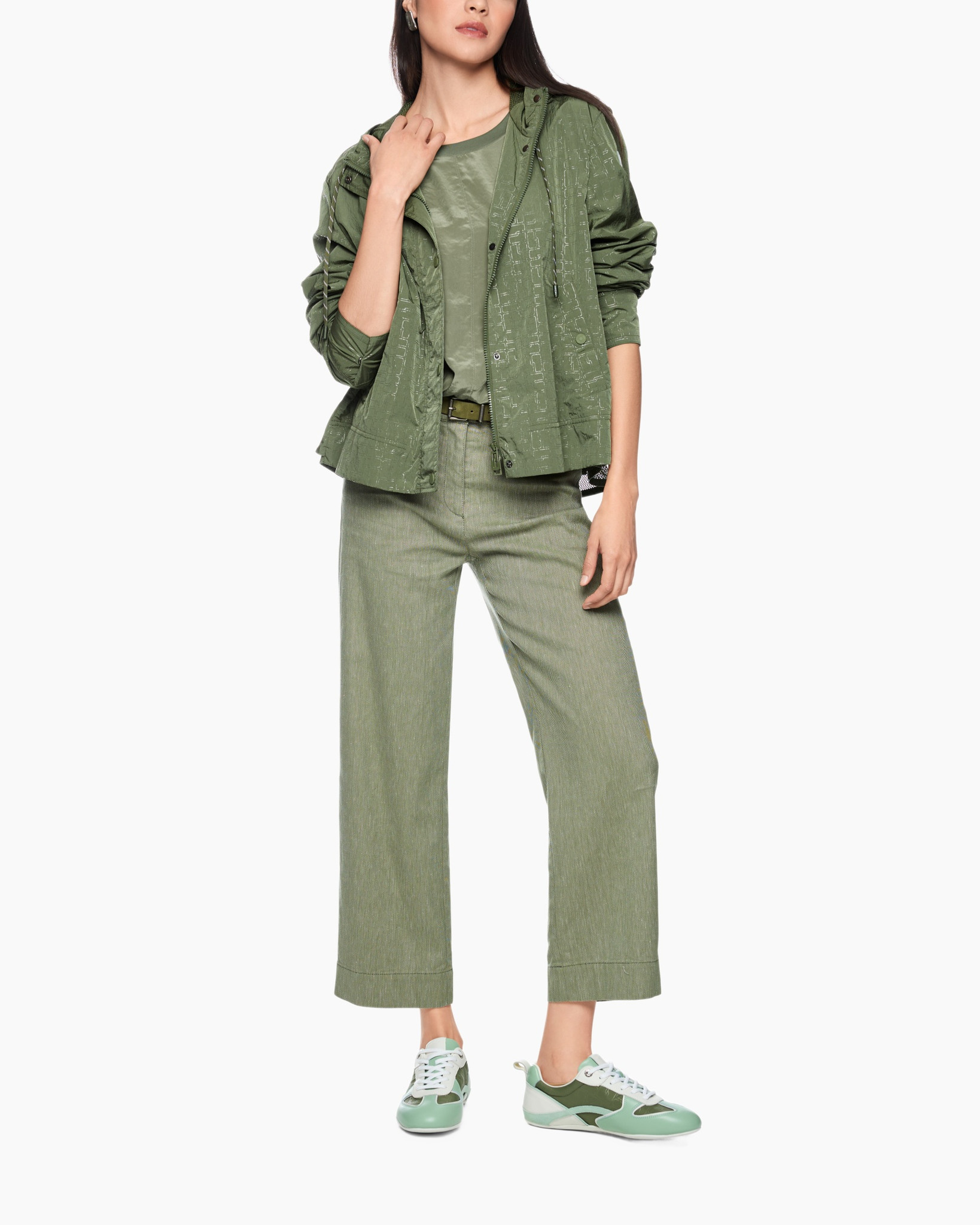 green jacket, windbreaker, camouflage pattern, green pants, sneakers