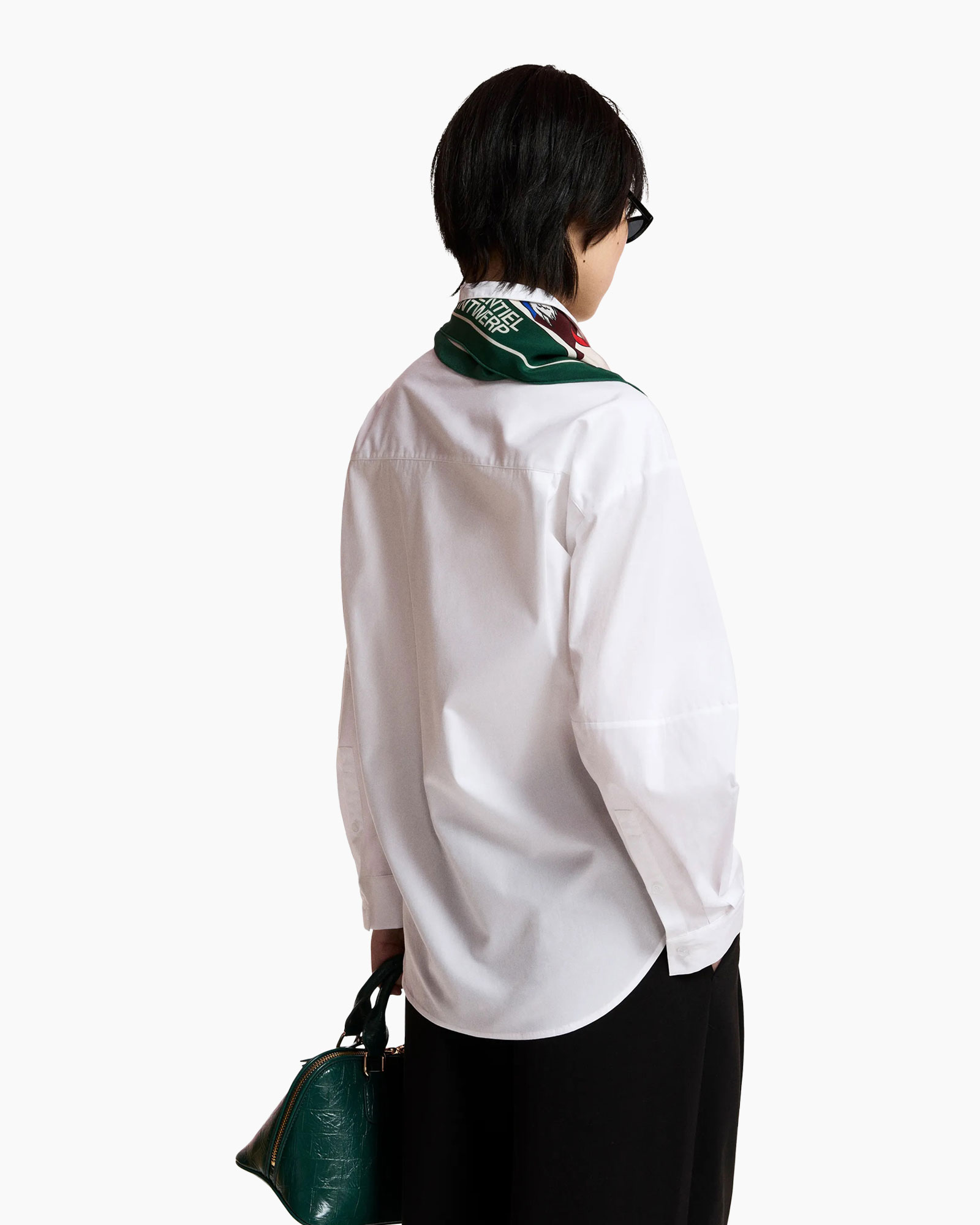 white shirt, wrap blouse, neck scarf, dark sunglasses, green scarf