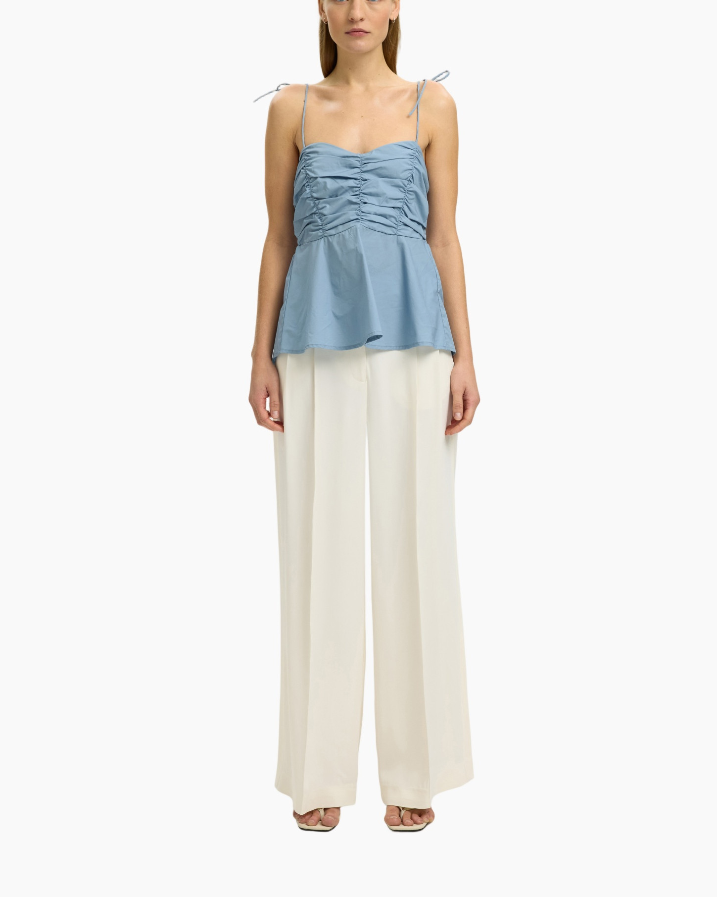 blue top, ruched bodice, spaghetti straps, peplum, wide-leg pants