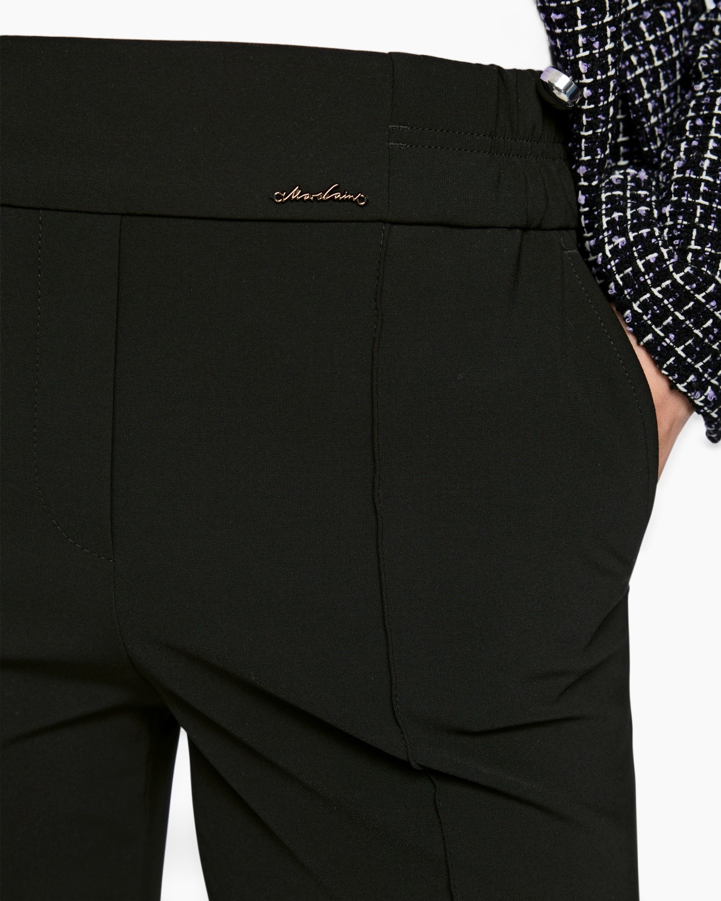 black pants, slacks, waistband, pocket, metal-logo